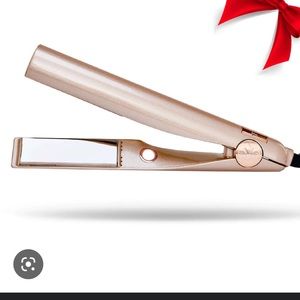 Tyme Iron with box, instructions, and protective sleeve.